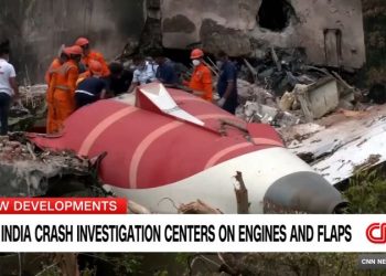 Sole survivor of Air India crash lays his brother to rest after leaving hospital